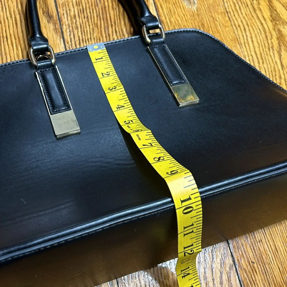 Aldo Faux leather handbag. Shoulder strap missing. Good condition. Black.